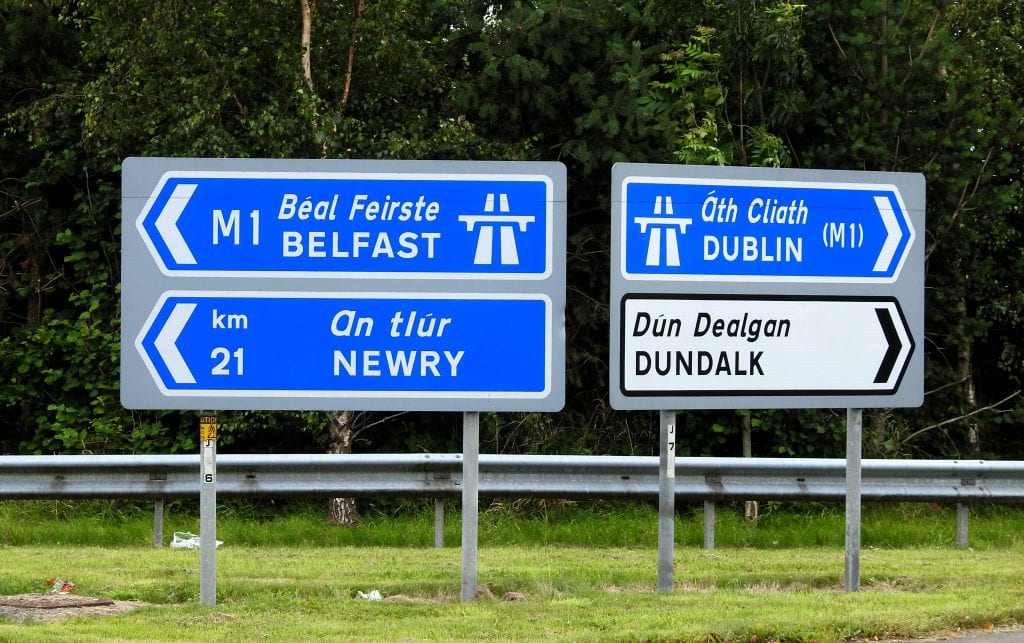 sign post for belfast, newry and dundalk, dublin for green card