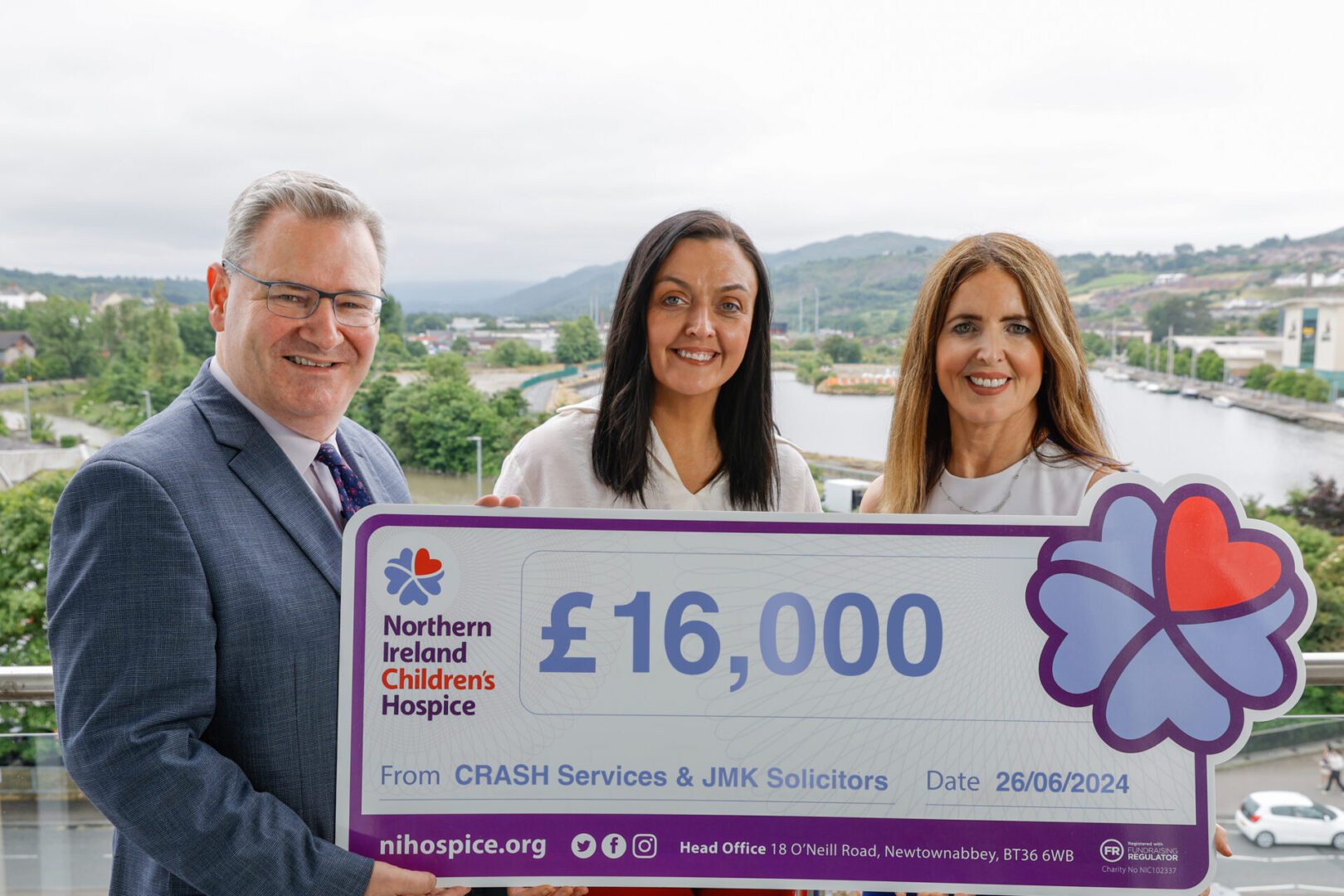 CRASH Services and JMK present £16,000 cheque to NI Hospice
